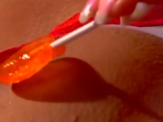 Turned on pirang audrianna mulékaté rubs her sticky slot with a lolliop and fucks putz